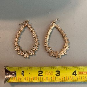 Ladies gold tone dangle hoop earrings. UGC flowers,